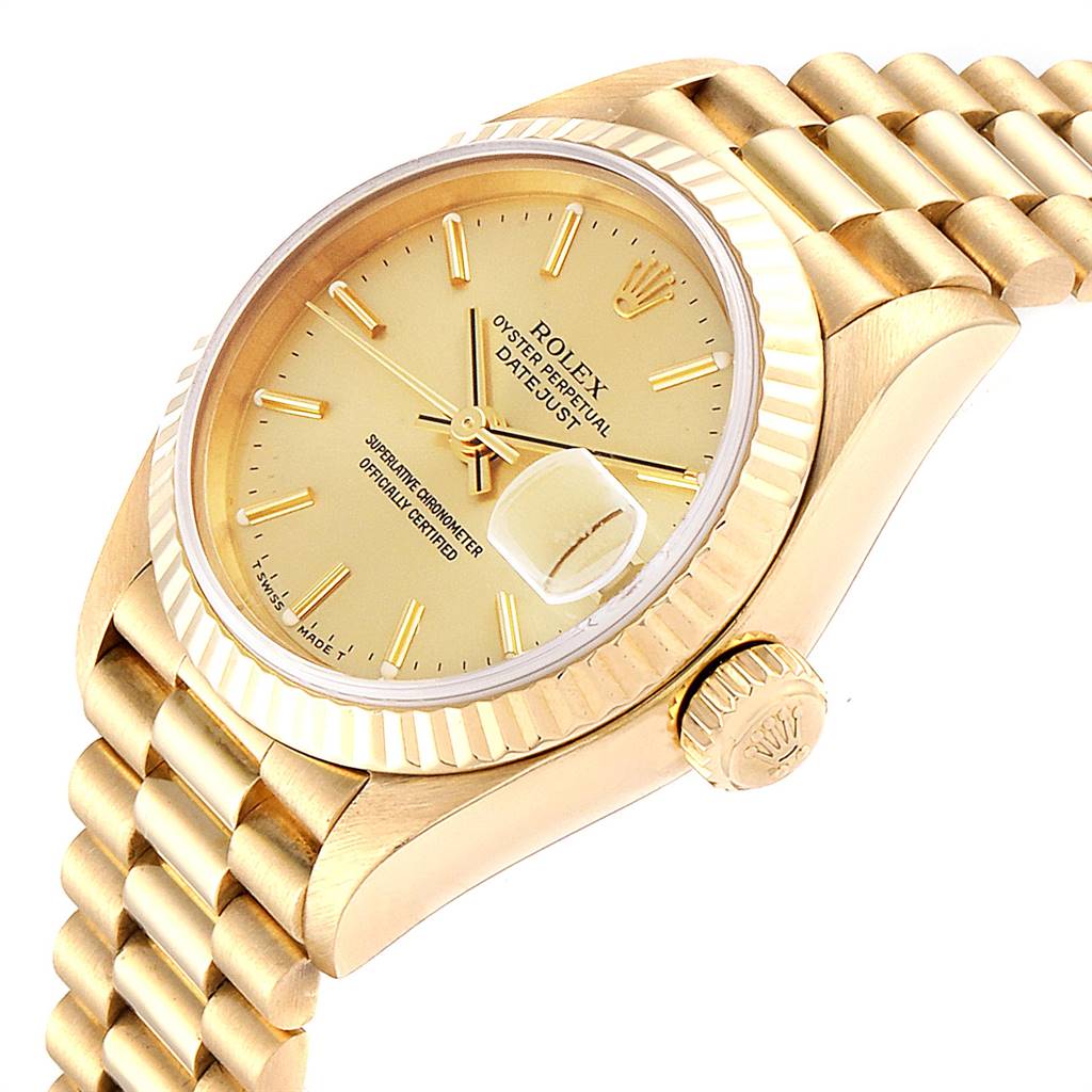 The image shows a close-up, side angle of the Rolex President 79178 Women's Yellow Gold Champagne Dial 79178 Women's Yellow Gold Champagne Dial model watch, highlighting its gold dial, fluted bezel, and bracelet.