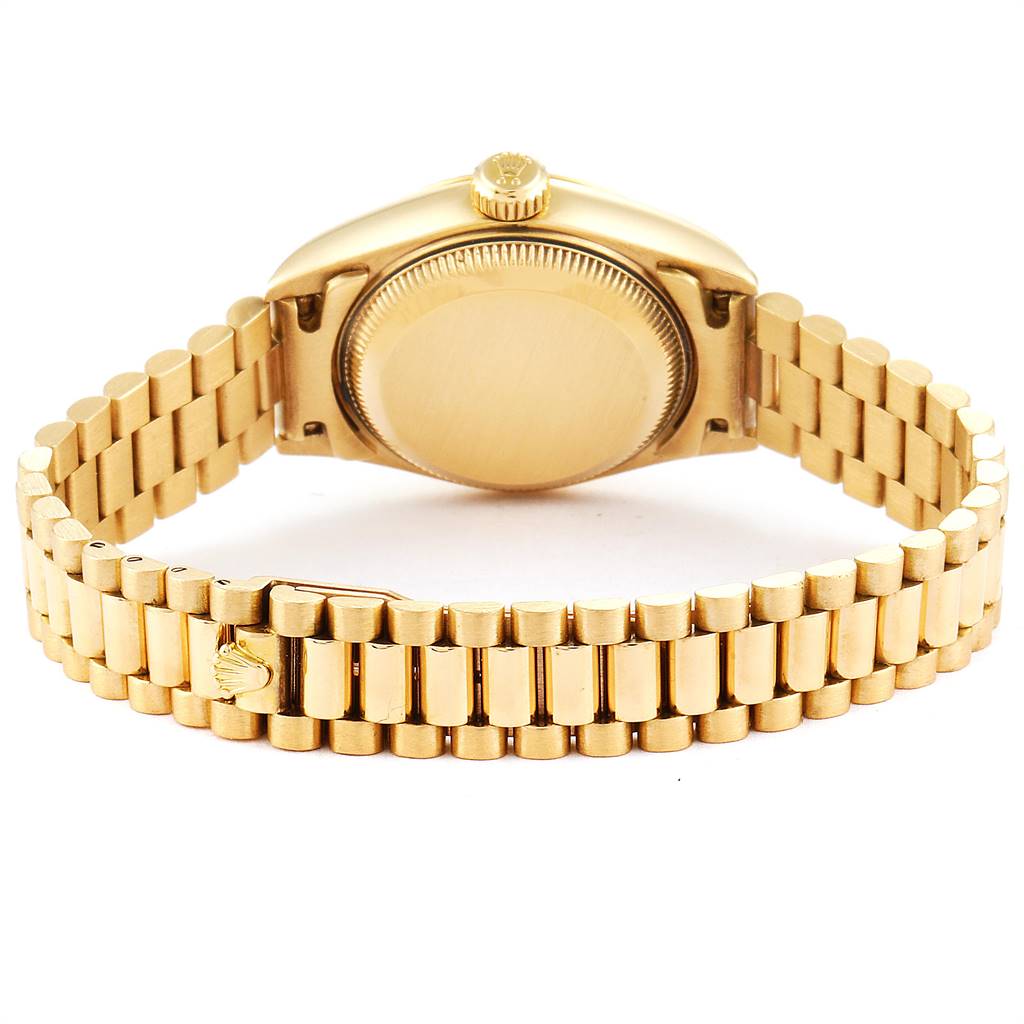 This image shows the backside and bracelet of the Rolex President 79178 Women's Yellow Gold Champagne Dial 79178 Women's Yellow Gold Champagne Dial model watch in gold.