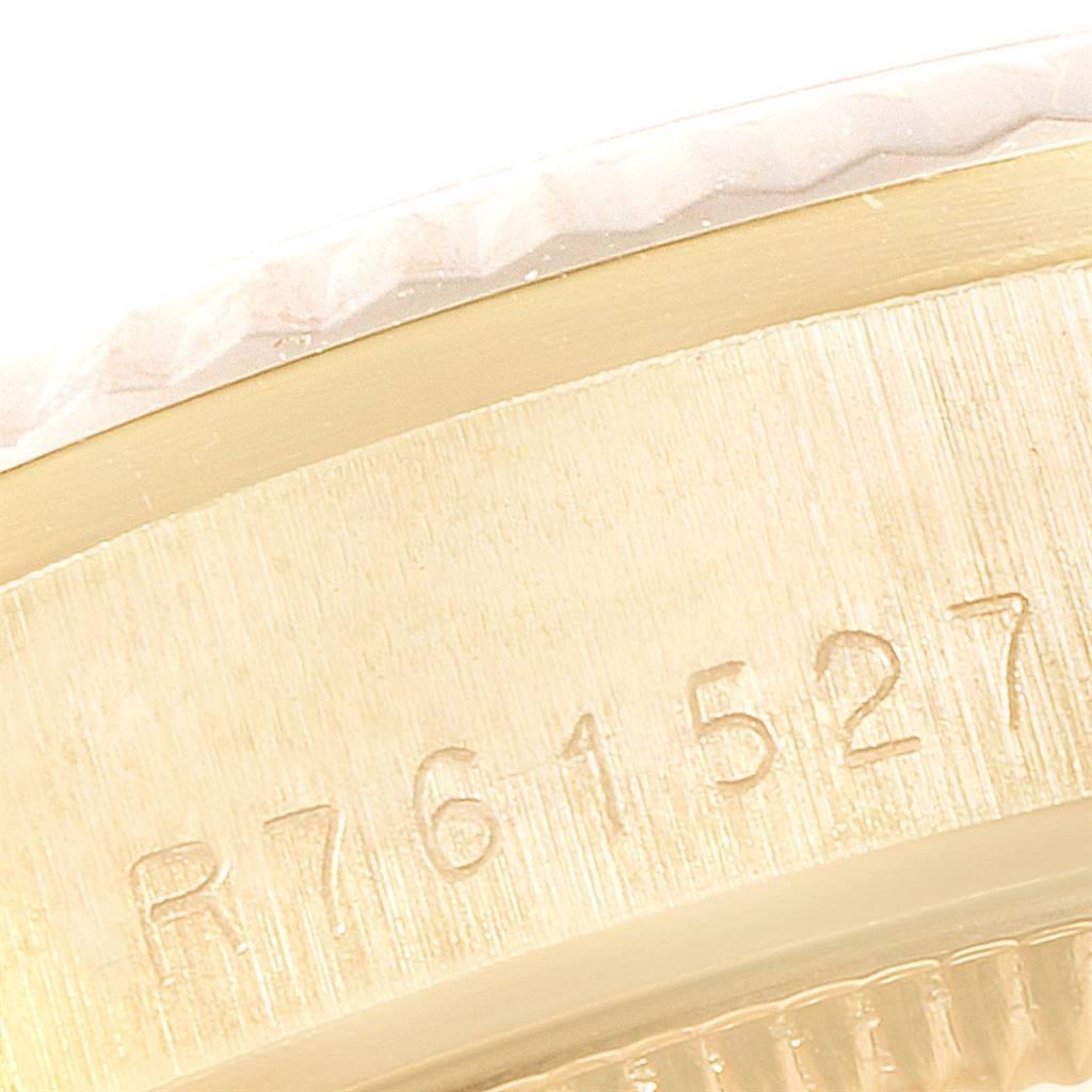 This close-up image shows the serial number engraving on a President model by Rolex.