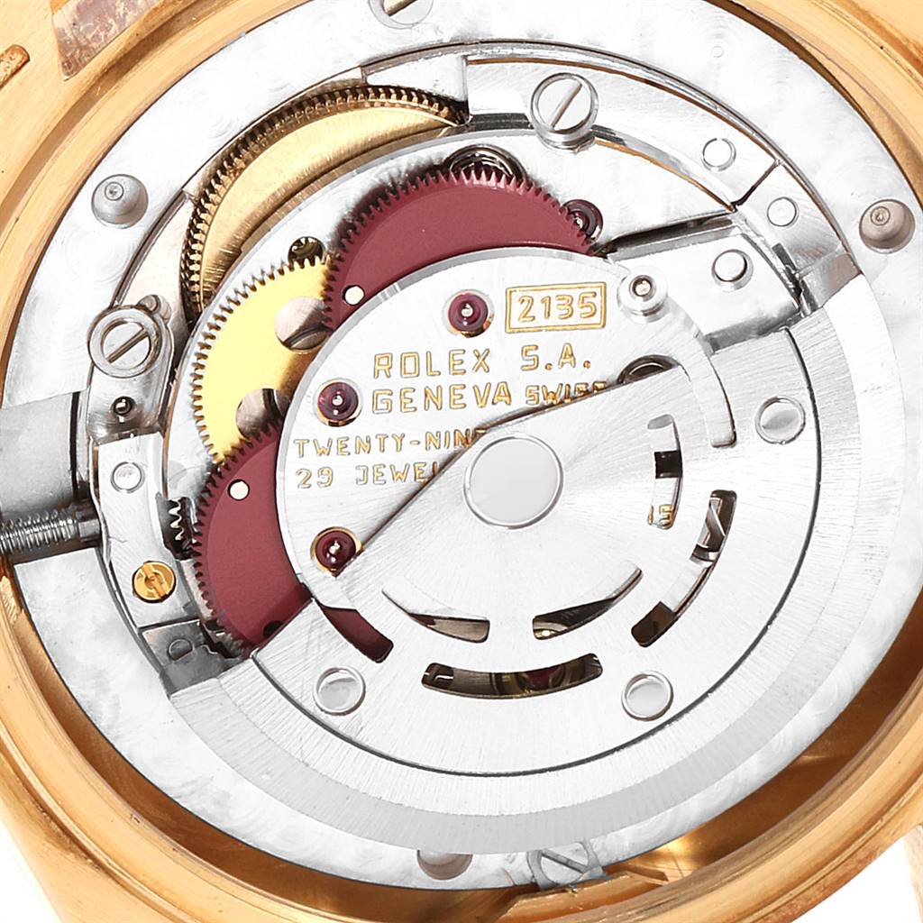 The image shows the close-up of the movement mechanism of a Rolex President 68278 Women
s Yellow Gold Champagne Dial 68278 Women
s Yellow Gold Champagne Dial model watch.