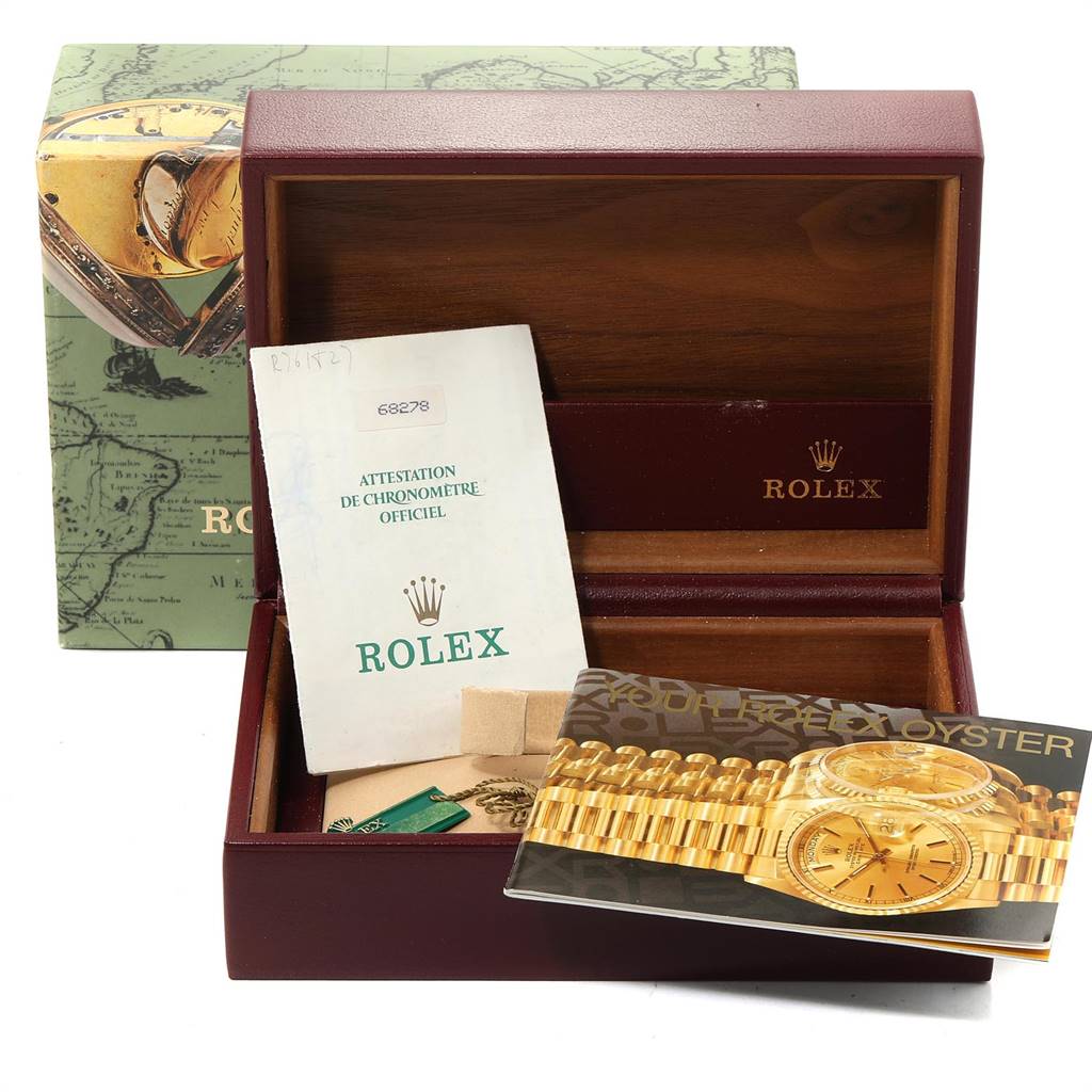 The image shows an open Rolex President 68278 Women
s Yellow Gold Champagne Dial 68278 Women
s Yellow Gold Champagne Dial model watch box with booklets and accessories included inside.
