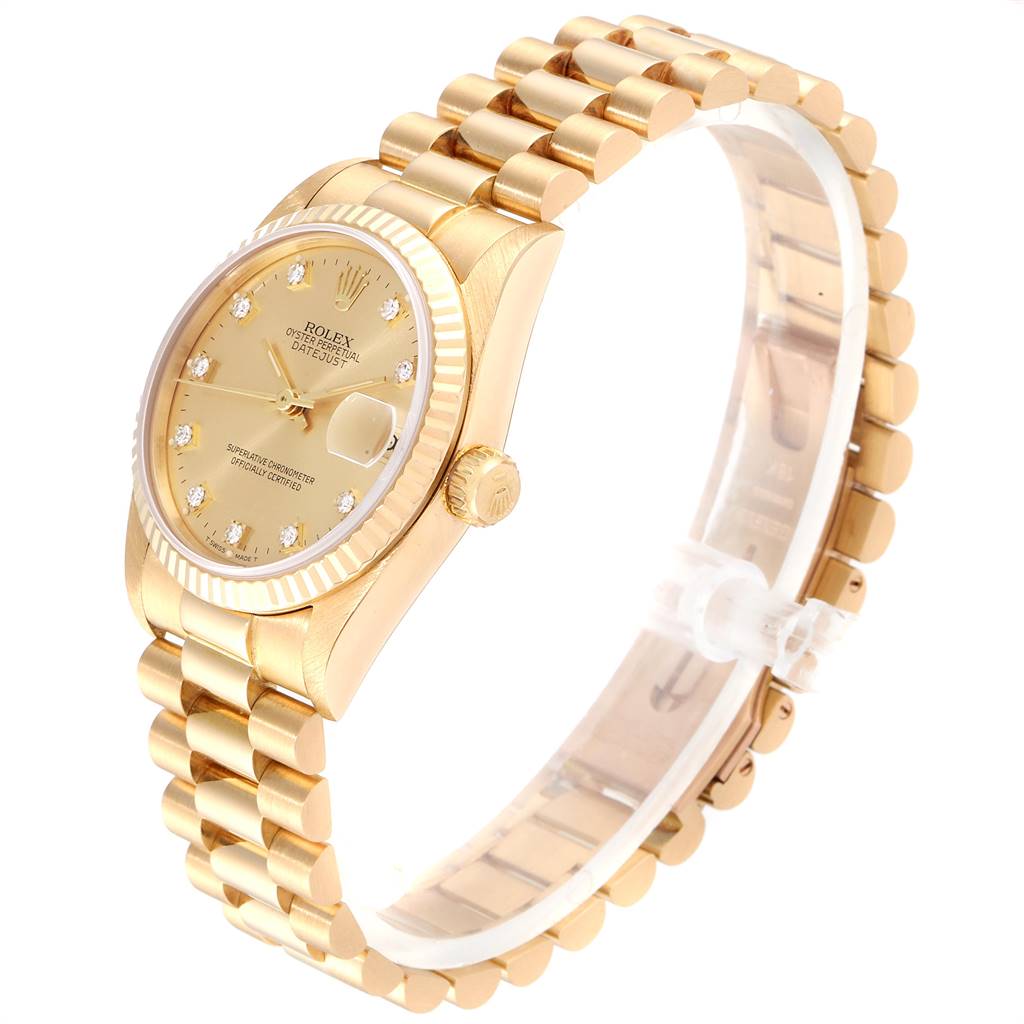 This image shows a side view of a Rolex President 68278 Women
s Yellow Gold Champagne Dial 68278 Women
s Yellow Gold Champagne Dial model watch, highlighting the gold case, bracelet, and the crown.