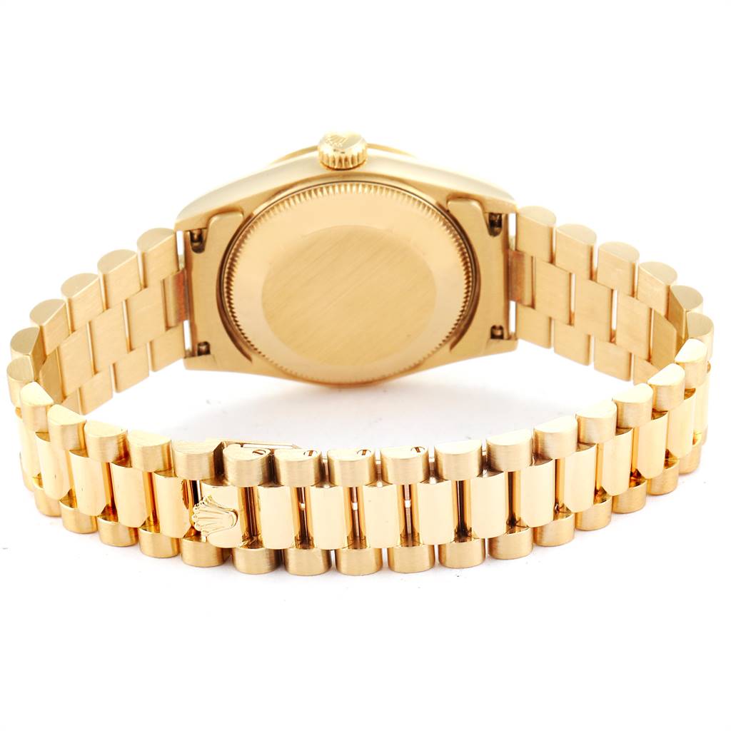 This image shows the back and band of a Rolex President 68278 Women
s Yellow Gold Champagne Dial 68278 Women
s Yellow Gold Champagne Dial model watch from a rear angle.