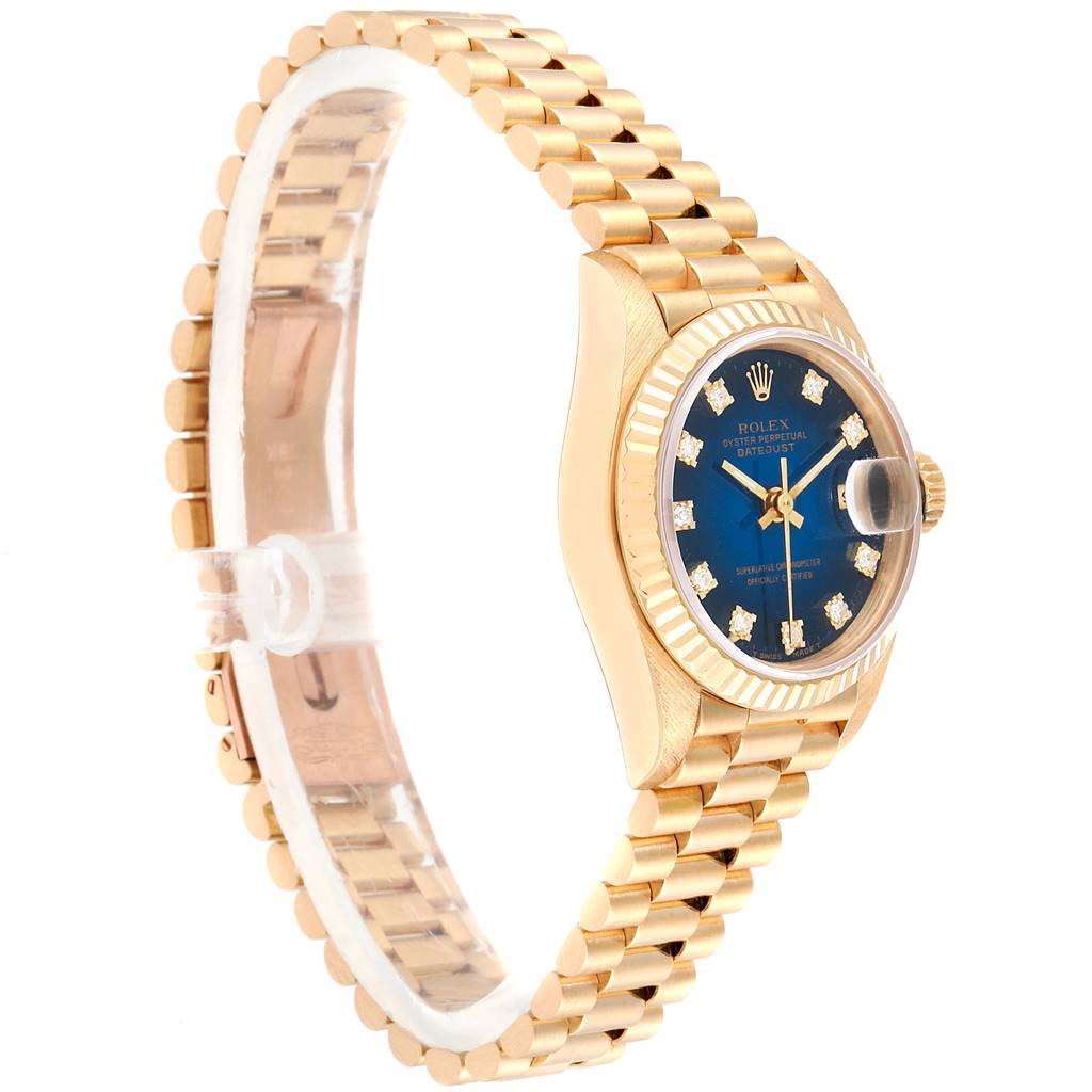 This image shows a Rolex President 69178 Women's Yellow Gold Blue Dial 69178 Women's Yellow Gold Blue Dial model watch from a side angle, highlighting its gold bracelet and blue dial.