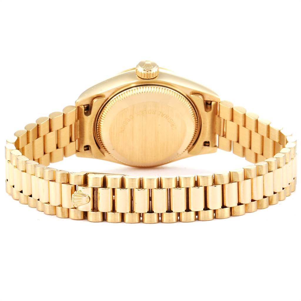 This image shows the back view of a gold Rolex President 69178 Women's Yellow Gold Blue Dial 69178 Women's Yellow Gold Blue Dial watch, focusing on the case back and bracelet.