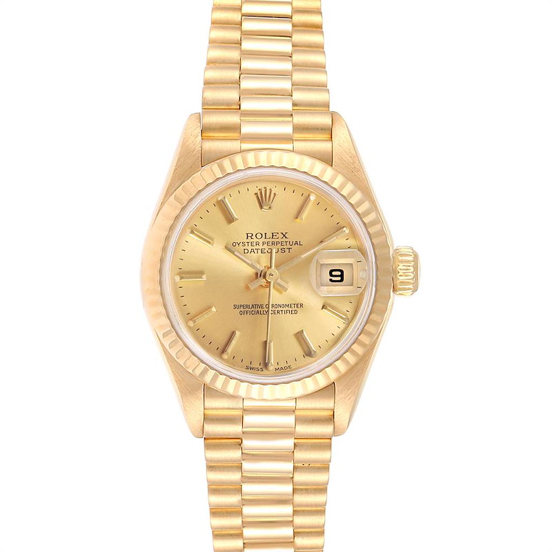 This image shows a front view of the gold Rolex President model watch featuring its dial, bracelet, and date display.