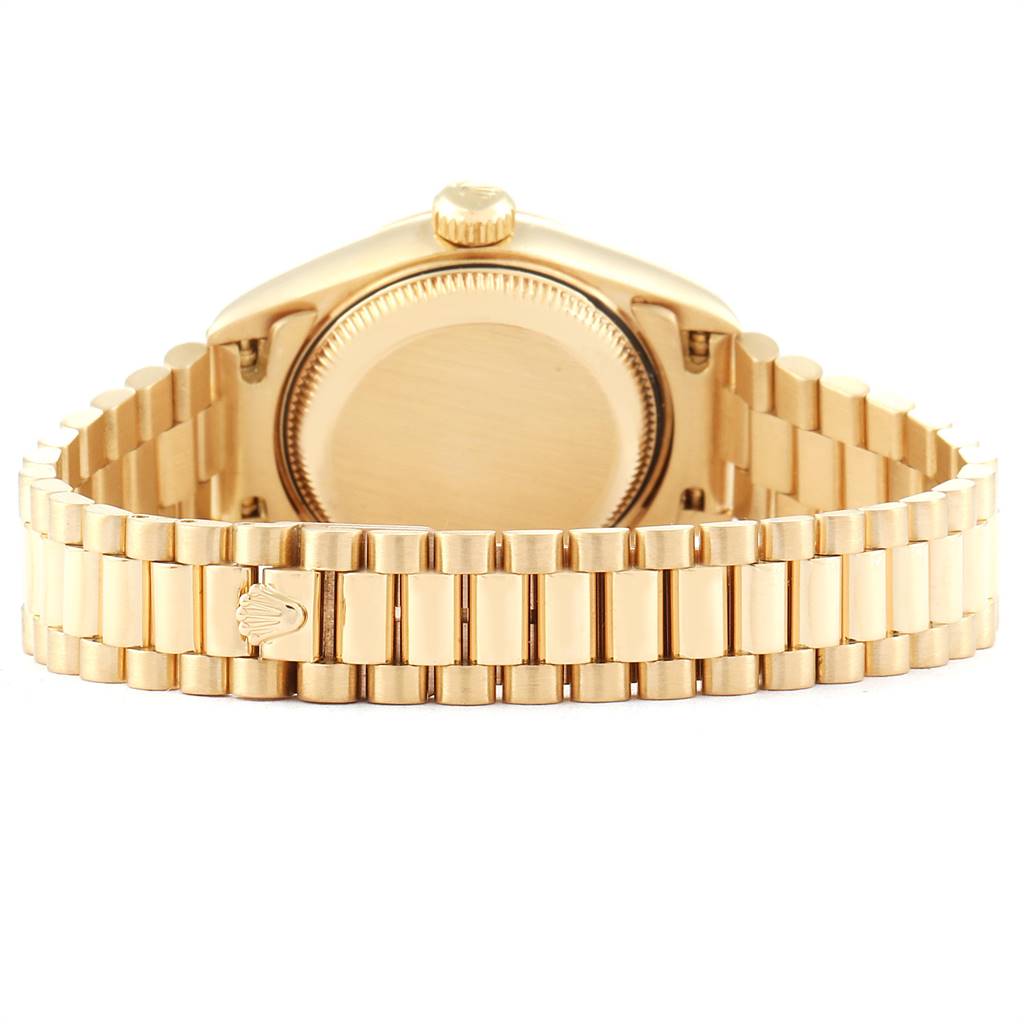 This image shows the back case and bracelet of a Rolex President 79178 Women
s Yellow Gold Champagne Dial 79178 Women
s Yellow Gold Champagne Dial model watch, viewed from the rear.