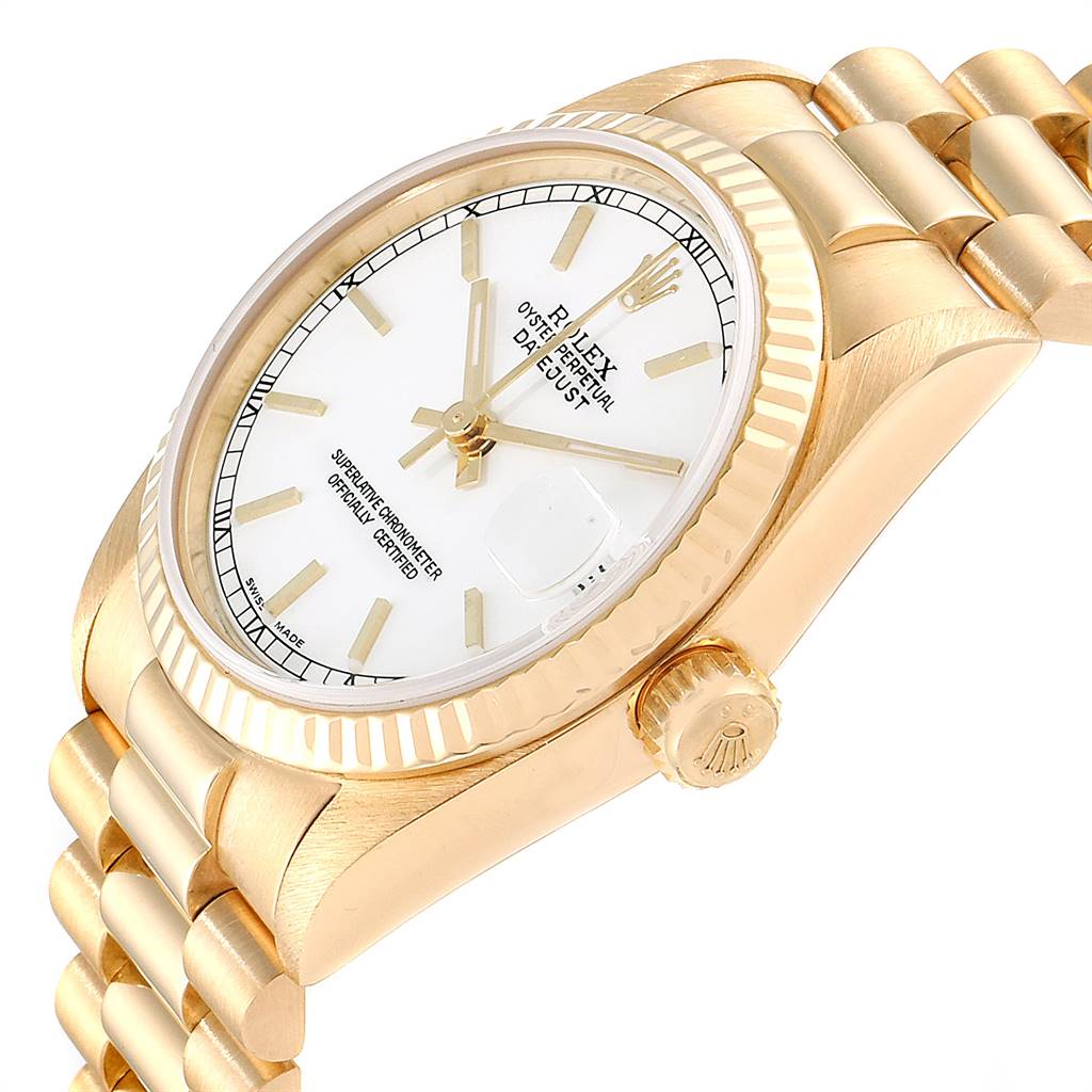 The image shows a side angle of the Rolex President 68278 Women
s Yellow Gold White Dial 68278 Women
s Yellow Gold White Dial model, featuring the watch face, bezel, crown, and part of the bracelet.