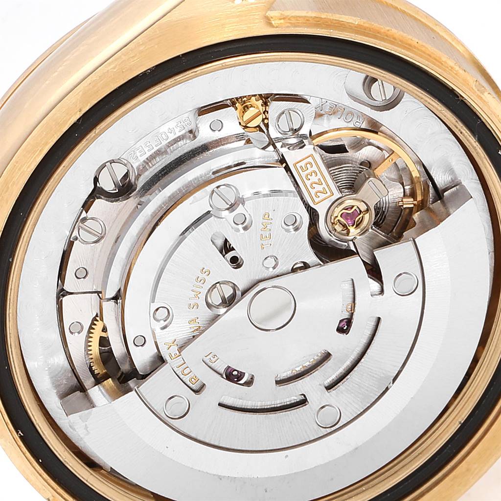 This close-up shot shows the internal movement and mechanisms of a Rolex President 178278 Women
s Yellow Gold Mother of Pearl Dial 178278 Women
s Yellow Gold Mother of Pearl Dial model watch.