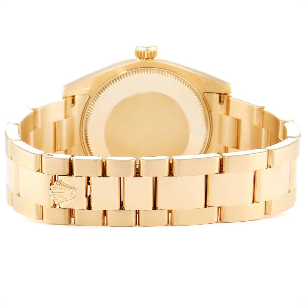 This image shows the back view of a Rolex President 178278 Women
s Yellow Gold Mother of Pearl Dial 178278 Women
s Yellow Gold Mother of Pearl Dial model watch, highlighting the case back and bracelet clasp.