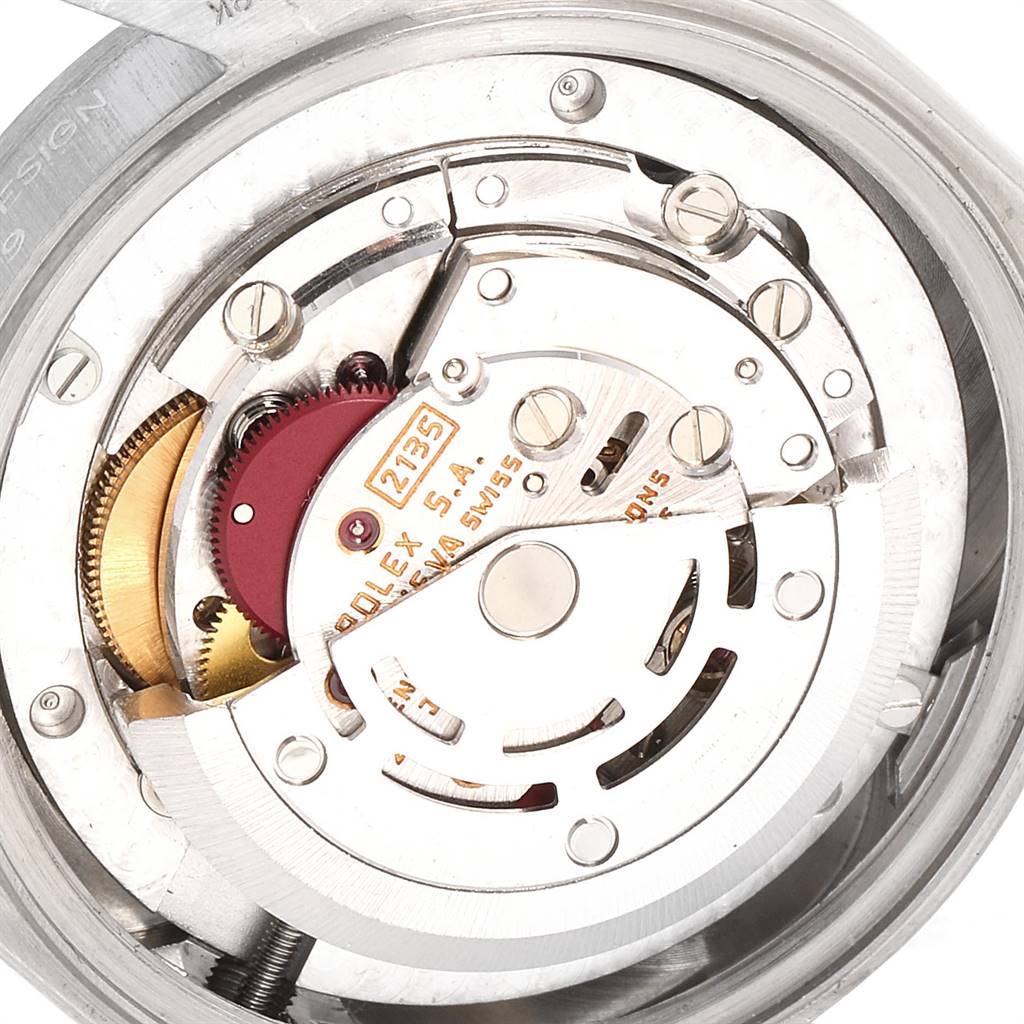 This close-up shot shows the mechanical movement parts of a Rolex President 68279 Women's White Gold White Dial 68279 Women's White Gold White Dial model watch.