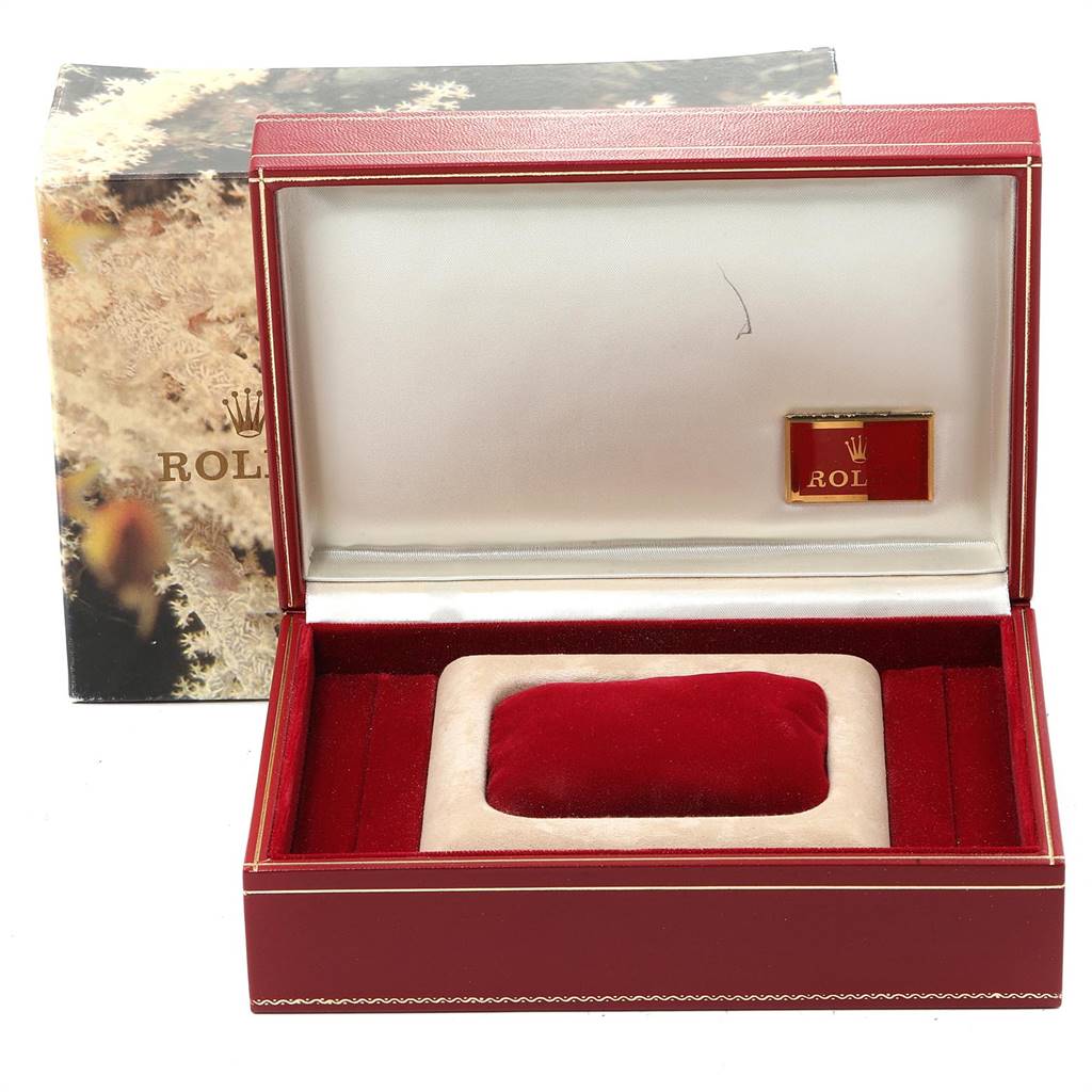 The image shows an empty storage box for the Rolex President 68279 Women's White Gold White Dial 68279 Women's White Gold White Dial model watch, angled from the front, showcasing the interior padding.