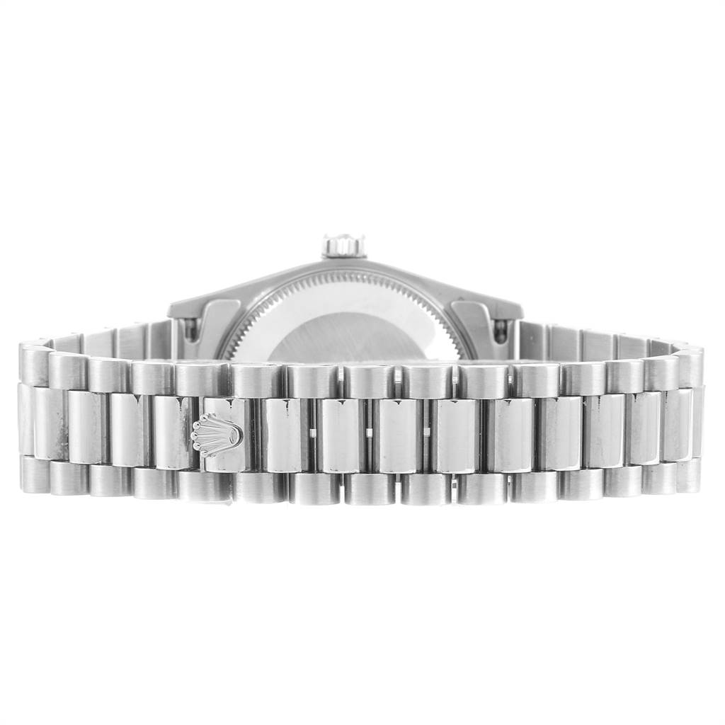 This image shows the back of the Rolex President 68279 Women's White Gold White Dial 68279 Women's White Gold White Dial watch, including the case back and the bracelet with the Rolex logo.