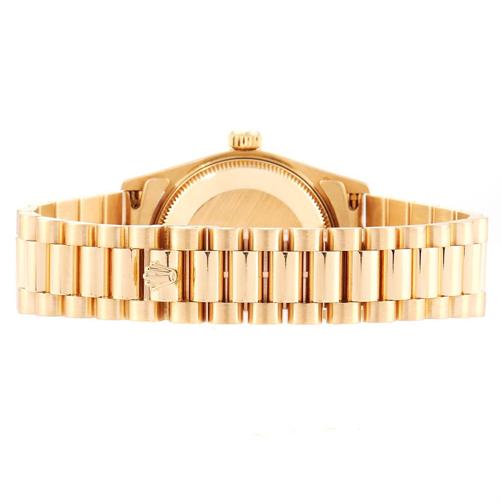 This image shows the backside and bracelet of a Rolex President 68278 Women
s Yellow Gold Champagne Dial 68278 Women
s Yellow Gold Champagne Dial model watch.