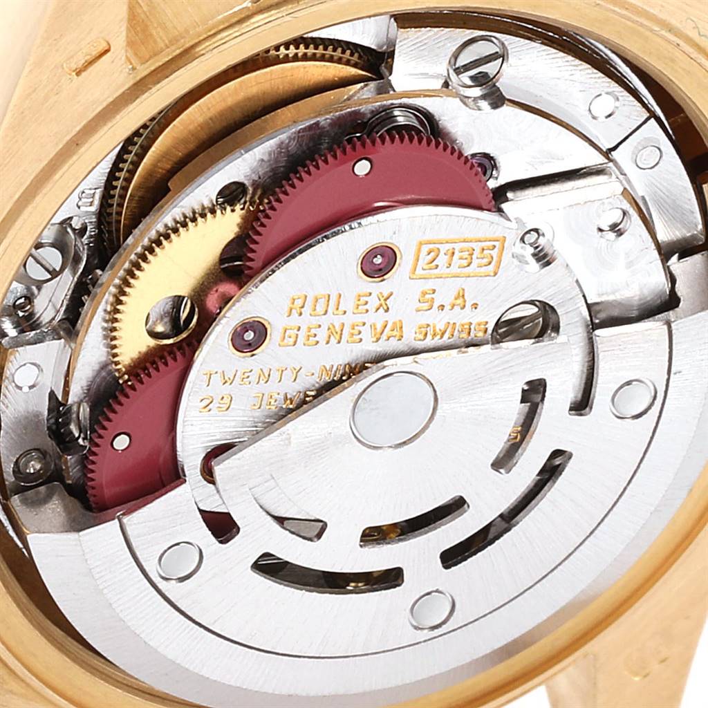 The image shows the movement mechanism of a Rolex President 69138 Women's Yellow Gold Blue Dial 69138 Women's Yellow Gold Blue Dial model watch from a close-up angle.
