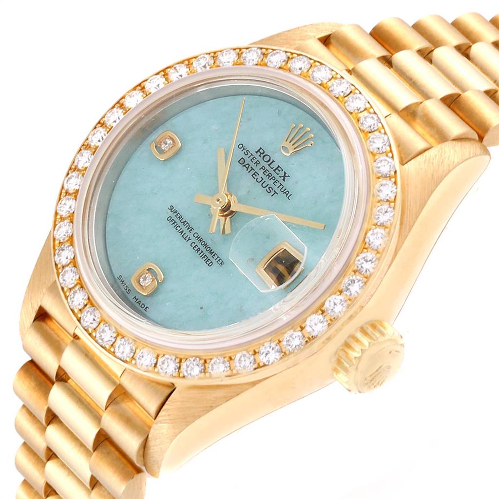 The image shows a close-up, angled view of a Rolex President 69138 Women's Yellow Gold Blue Dial 69138 Women's Yellow Gold Blue Dial model watch, focusing on the face and part of the bracelet.
