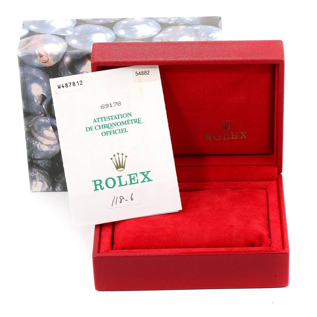 The image shows the red box and official documentation for a Rolex President 69178 Women
s Yellow Gold Champagne Dial 69178 Women
s Yellow Gold Champagne Dial model watch.