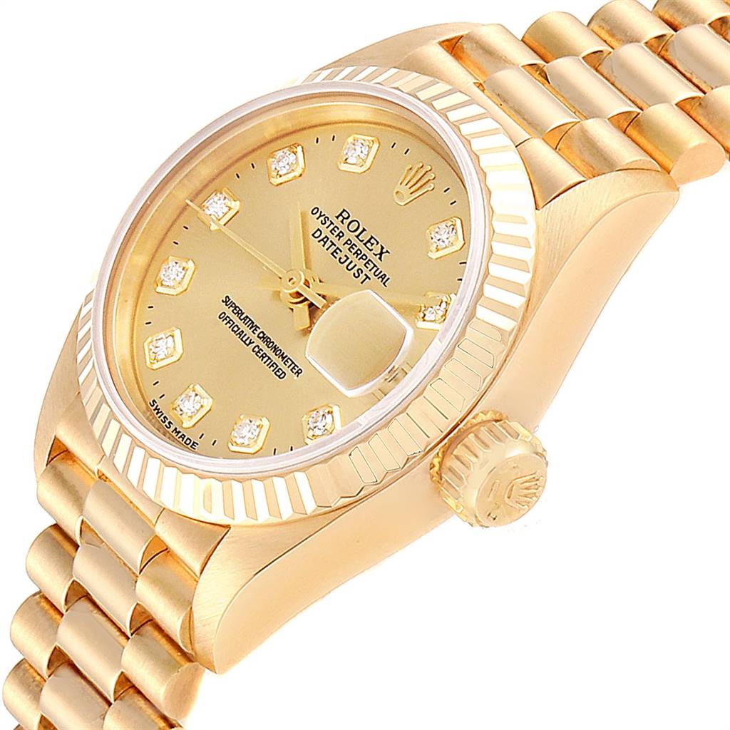 The image shows a Rolex President 69178 Women
s Yellow Gold Champagne Dial 69178 Women
s Yellow Gold Champagne Dial model watch at an oblique angle, featuring the dial, fluted bezel, crown, and part of the bracelet.