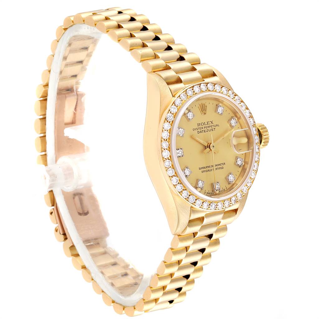 This Rolex President 69138 Women
s Yellow Gold Champagne Dial 69138 Women
s Yellow Gold Champagne Dial model watch is shown from a side angle highlighting the bracelet, bezel, dial, and crown.