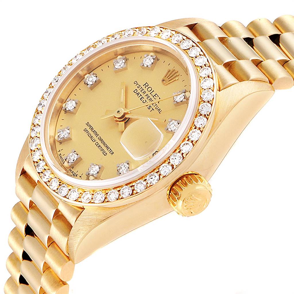 The image shows a side view of the Rolex President 69138 Women
s Yellow Gold Champagne Dial 69138 Women
s Yellow Gold Champagne Dial model, displaying the bezel, dial, crown, and part of the bracelet.