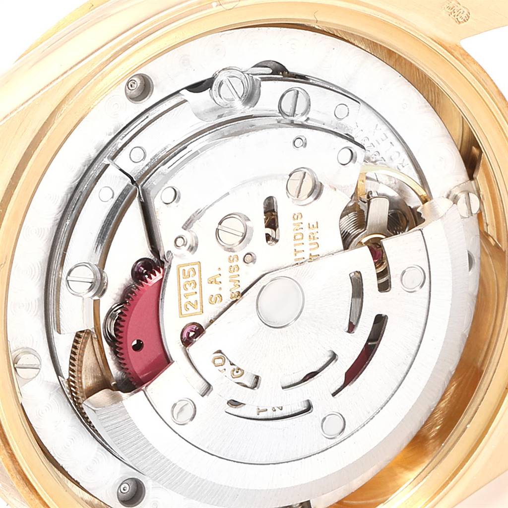 This image shows a close-up of the movement inside a Rolex President 68278 Women
s Yellow Gold Champagne Dial 68278 Women
s Yellow Gold Champagne Dial model watch, highlighting the intricate mechanical components.