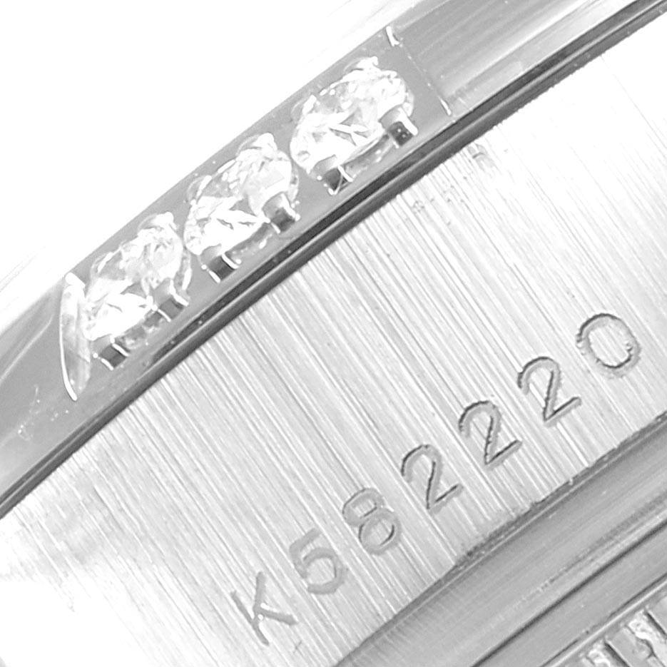 This image shows a close-up of the serial number and diamond details on the case of a Rolex President 179369 Women's White Gold Blue Dial 179369 Women's White Gold Blue Dial model watch.