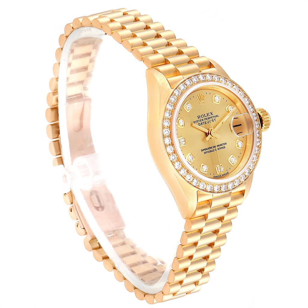The Rolex President 69138 Women
s Yellow Gold Champagne Dial 69138 Women
s Yellow Gold Champagne Dial model watch is shown at an angled side view, highlighting the gold bracelet, dial, and diamond-encrusted bezel.