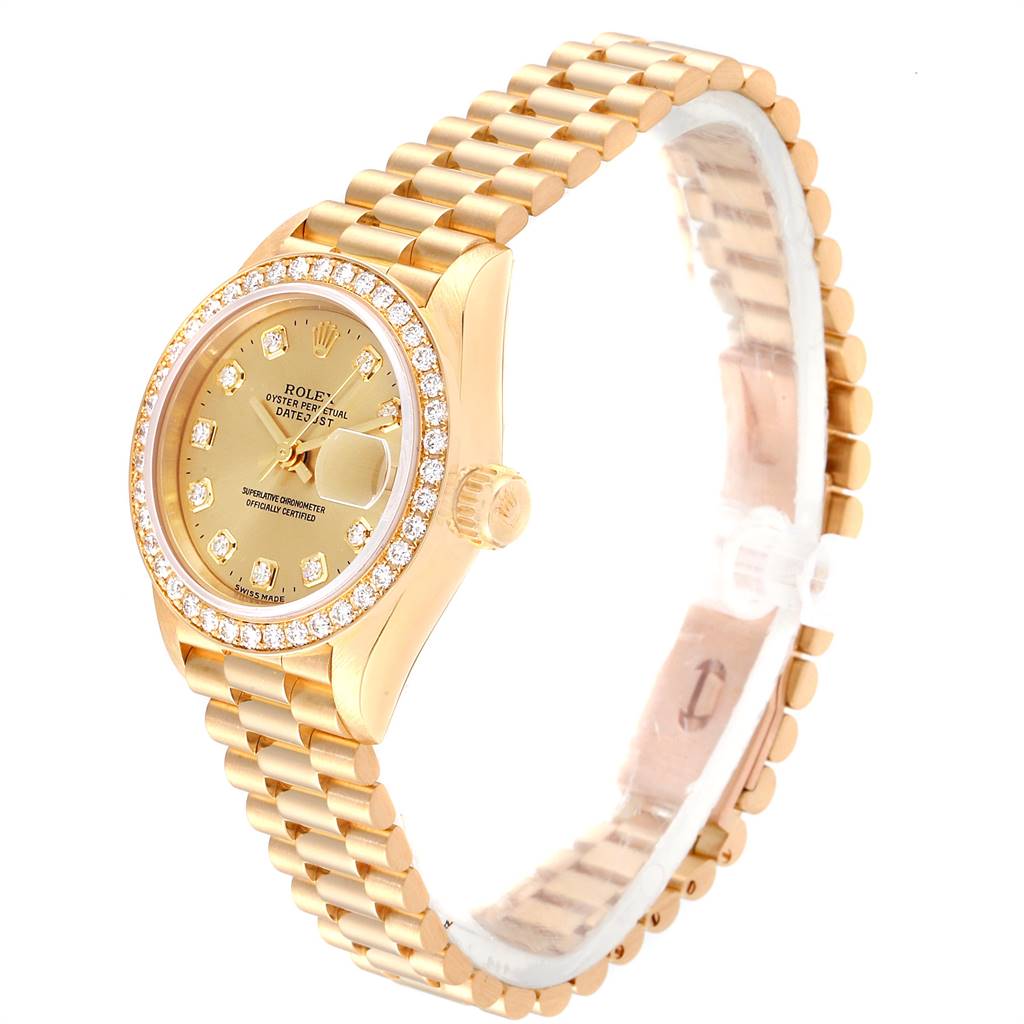 The image shows a gold Rolex President 69138 Women
s Yellow Gold Champagne Dial 69138 Women
s Yellow Gold Champagne Dial model watch at a three-quarter angle, highlighting the dial, bezel, and bracelet.