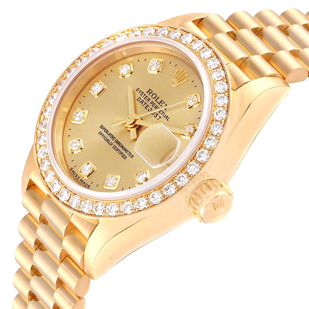 This Rolex President 69138 Women
s Yellow Gold Champagne Dial 69138 Women
s Yellow Gold Champagne Dial model watch is shown from an angled close-up, highlighting its diamond bezel, dial, and bracelet.