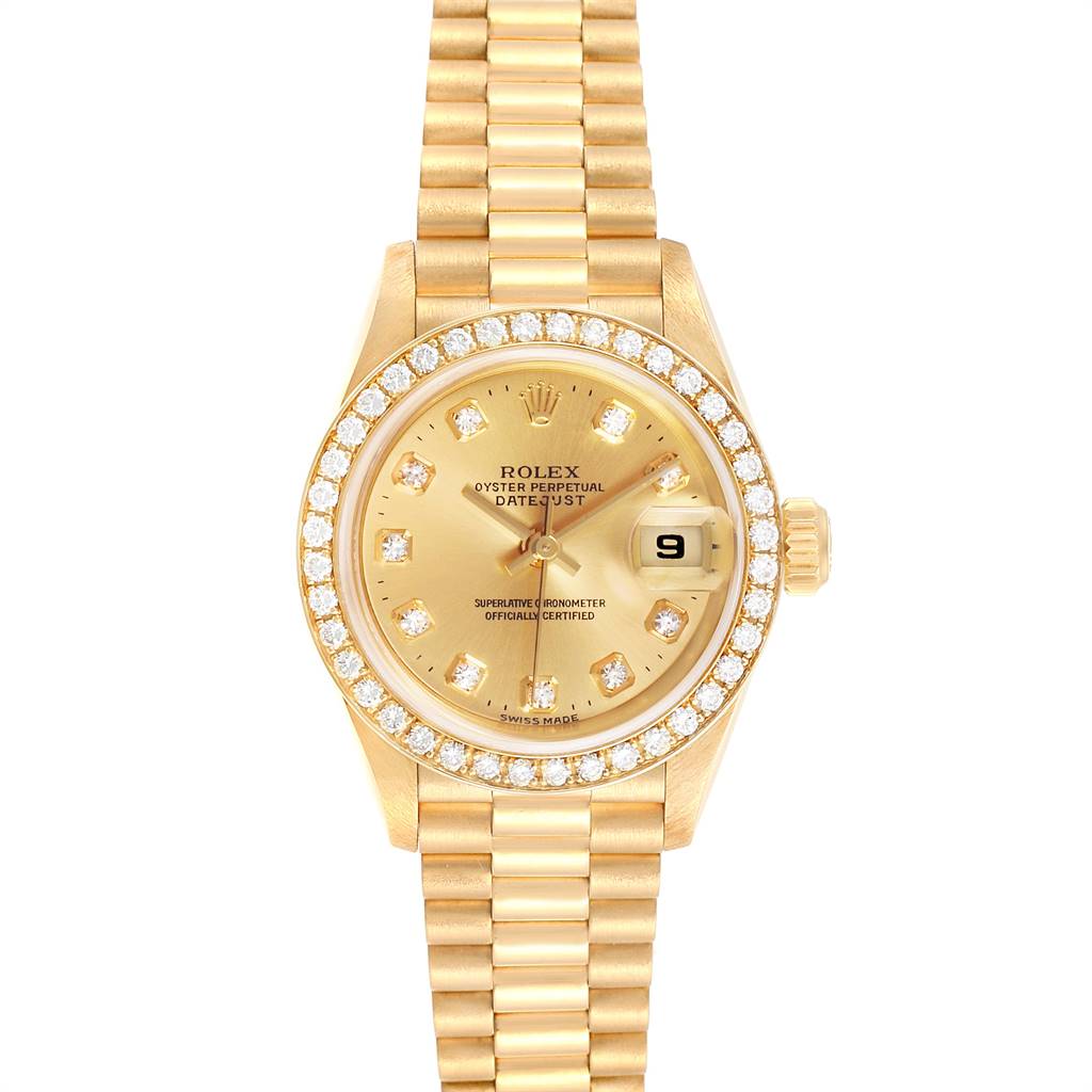 The image shows a frontal view of the Rolex President 69138 Women
s Yellow Gold Champagne Dial 69138 Women
s Yellow Gold Champagne Dial model watch, highlighting its gold case, diamond bezel, and bracelet.