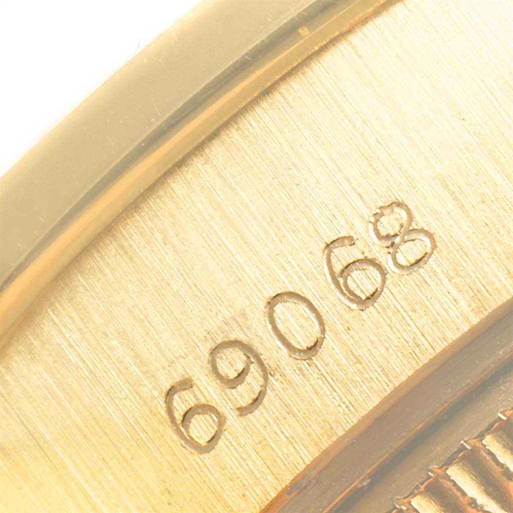 This image shows a close-up of the model number "69068" on the caseback of a Rolex President 69068 Women
s Yellow Gold Mother of Pearl Dial 69068 Women
s Yellow Gold Mother of Pearl Dial watch.