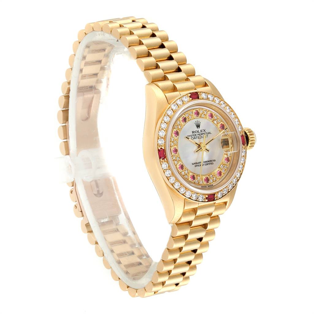 The Rolex President 69068 Women
s Yellow Gold Mother of Pearl Dial 69068 Women
s Yellow Gold Mother of Pearl Dial model watch is shown at a three-quarter angle, displaying its gold bracelet, crystal face, and diamond-encrusted bezel.