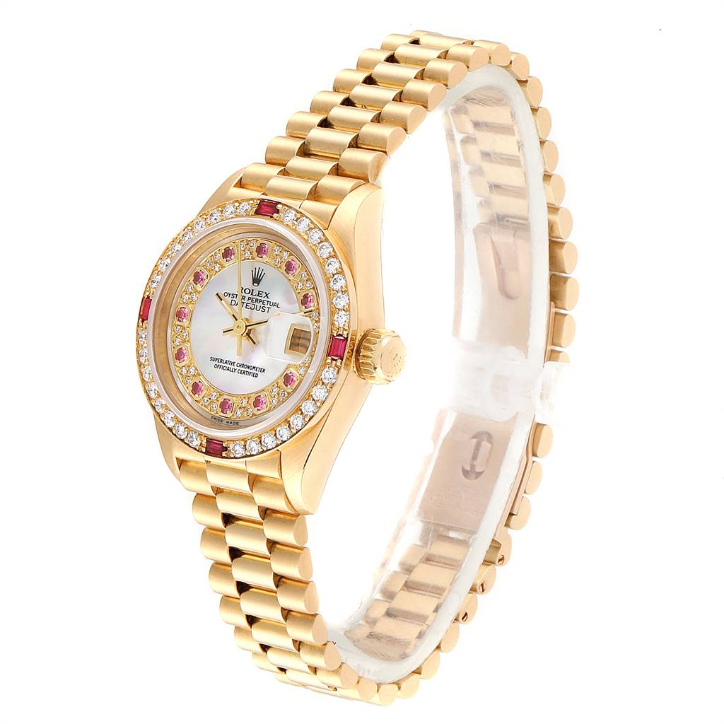 The image shows a Rolex President 69068 Women
s Yellow Gold Mother of Pearl Dial 69068 Women
s Yellow Gold Mother of Pearl Dial model watch at an angle that highlights its face, bezel, crown, and bracelet.