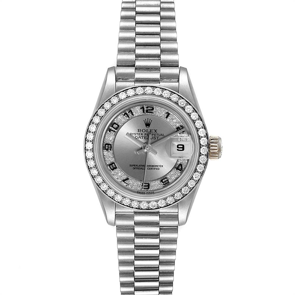 The image shows a top view of a Rolex President 69179 Women's White Gold Silver Dial 69179 Women's White Gold Silver Dial model watch, featuring a silver dial, date display, and diamond-encrusted bezel.