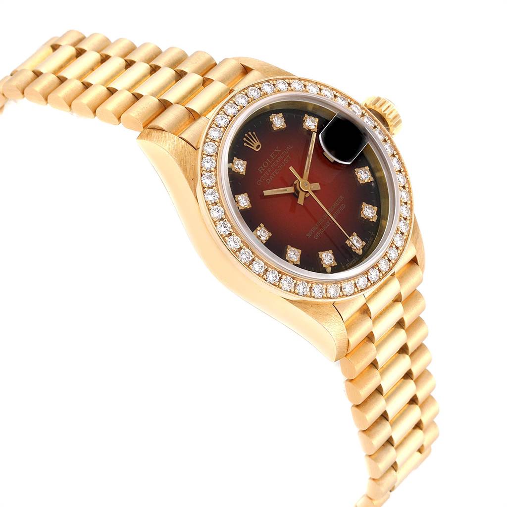 This image shows a side view of a Rolex President 69138 Yellow Gold Red Dial 69138 Yellow Gold Red Dial model watch, highlighting the bezel, dial, and bracelet.