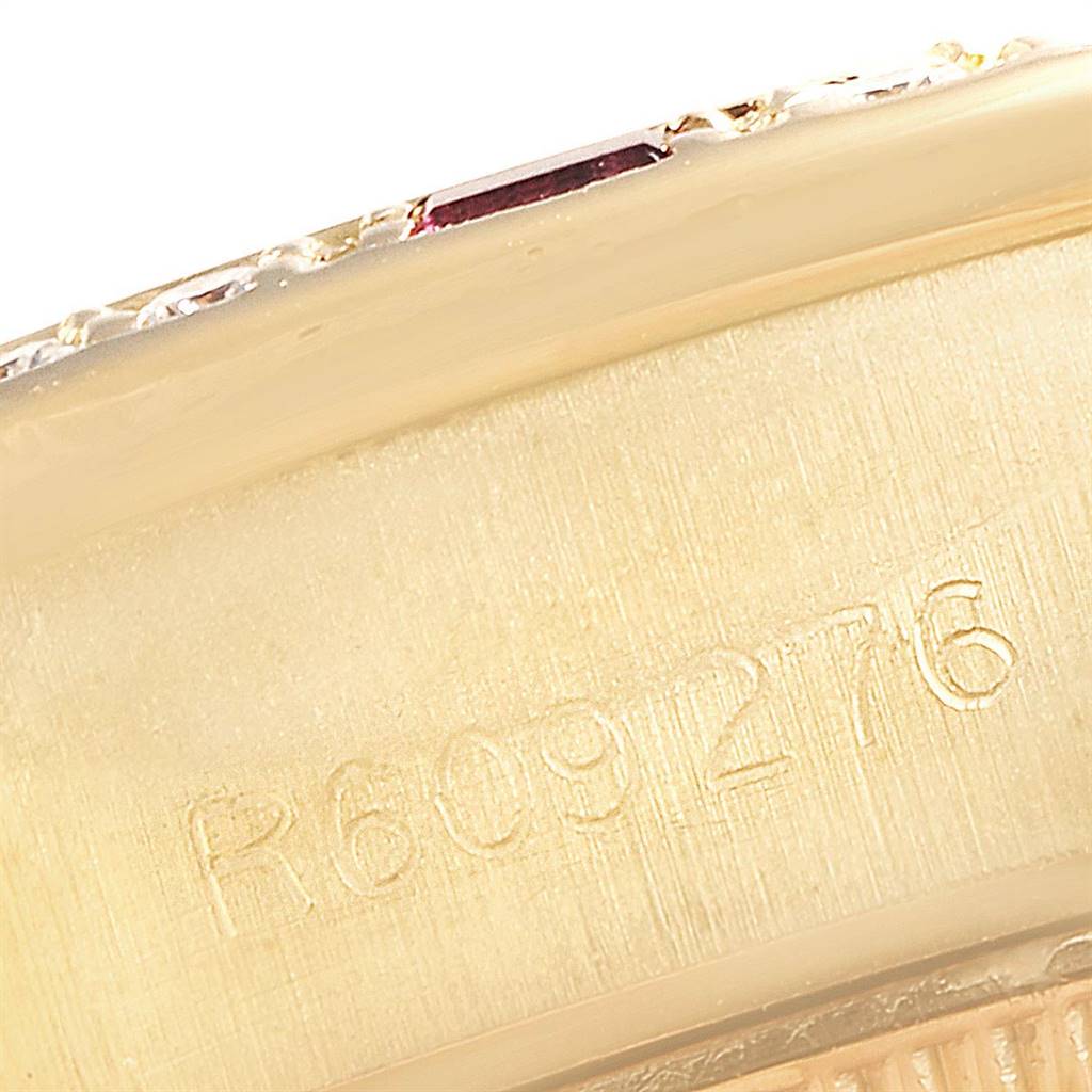 This image shows a close-up of the engraved serial number on a Rolex President 69068 Women's Yellow Gold Champagne Dial 69068 Women's Yellow Gold Champagne Dial model watch.