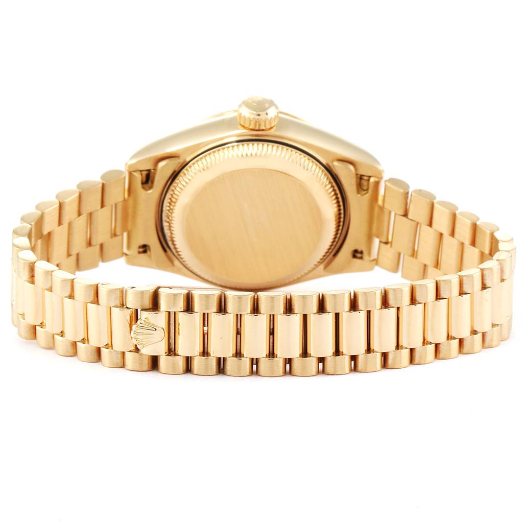 This image shows the back of the Rolex President 69178 Women's Yellow Gold White Dial 69178 Women's Yellow Gold White Dial model watch, focusing on the clasp and case back.