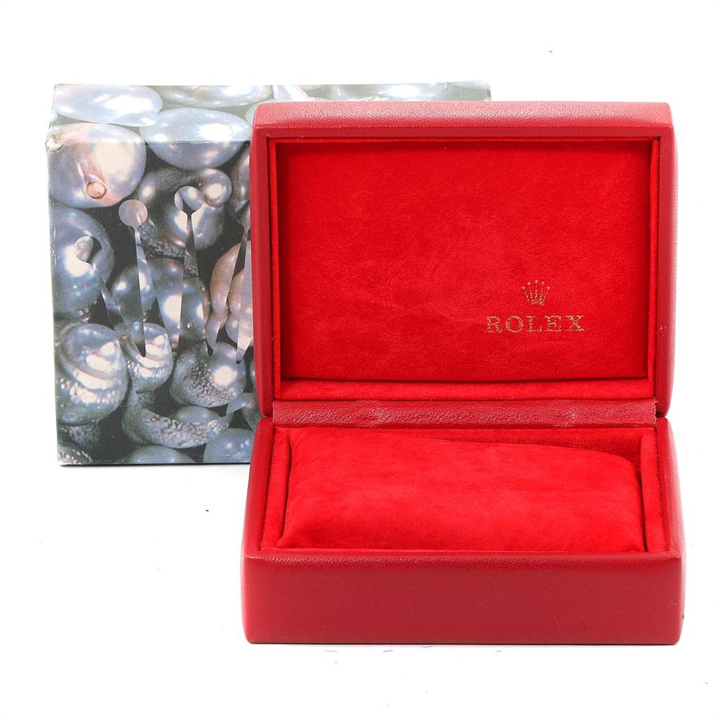 This image shows a red Rolex watch box, likely for a President model, with the inner red velvet cushion and outer packaging.