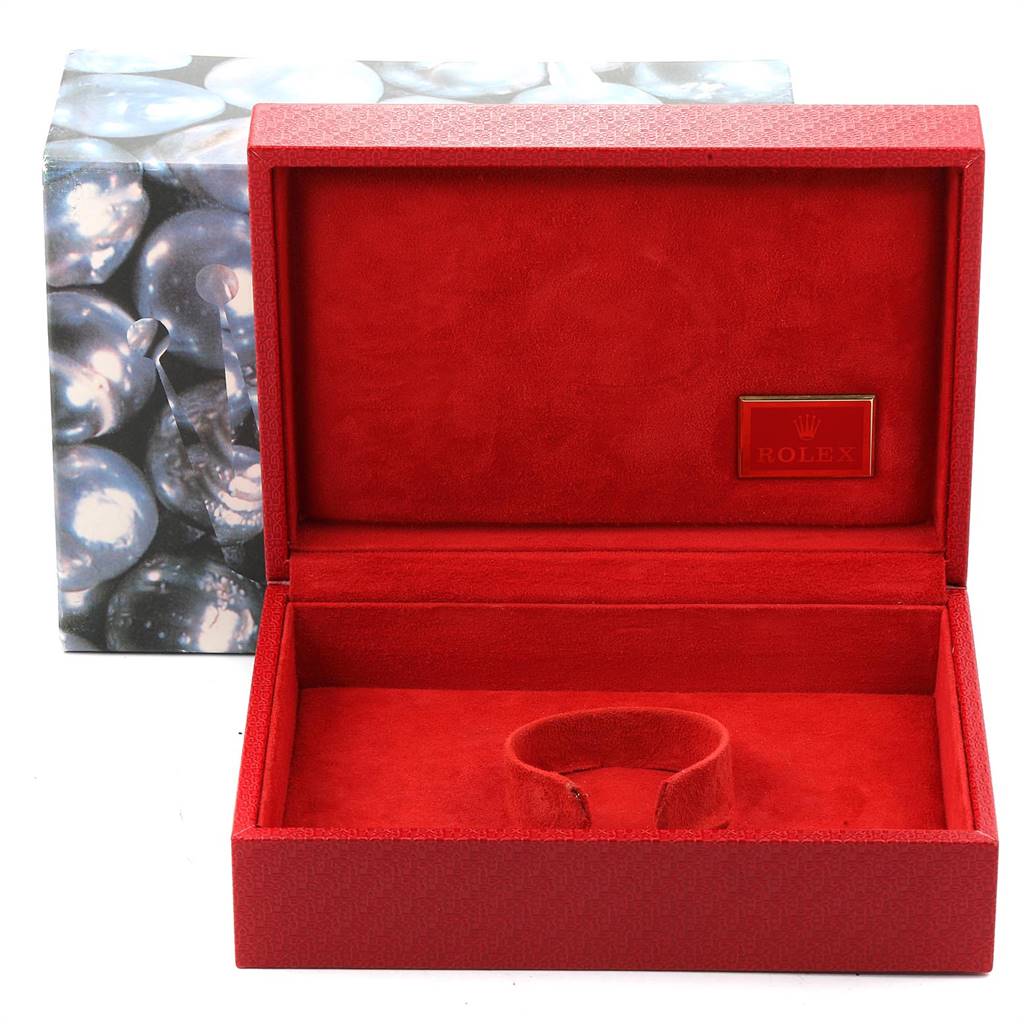 The image displays an open Rolex President 69138 Women's Yellow Gold Blue Dial 69138 Women's Yellow Gold Blue Dial model watch box with a red interior and a logo inside.