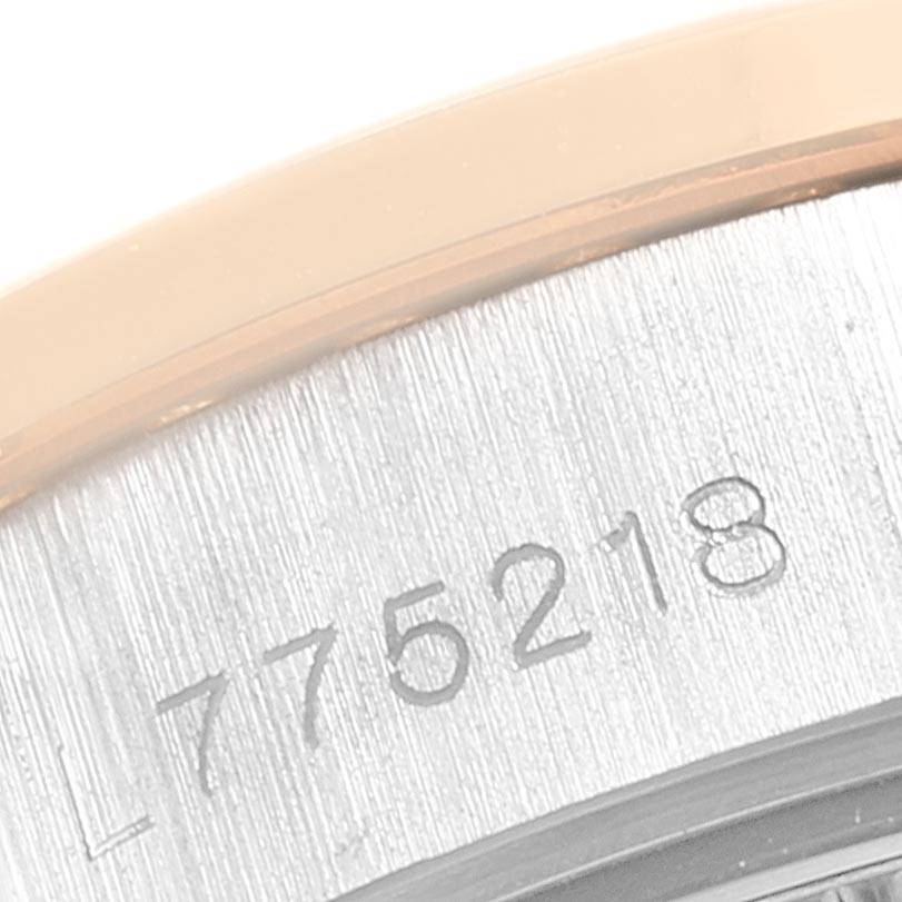 This close-up angle shows the serial number engraving on the caseback of a Rolex President 69179 Women's White Gold Brown Dial 69179 Women's White Gold Brown Dial model watch.