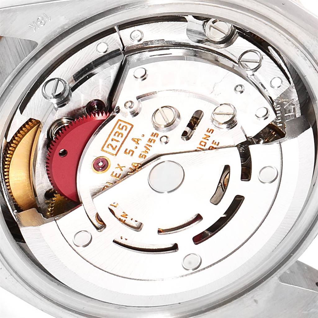 This close-up image shows the intricate inner mechanics of the Rolex President 69179 Women's White Gold Brown Dial 69179 Women's White Gold Brown Dial model watch.