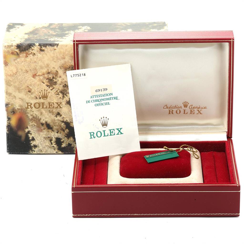 This image shows a Rolex President 69179 Women's White Gold Brown Dial 69179 Women's White Gold Brown Dial model presentation box, certification card, and tag in a frontal view.