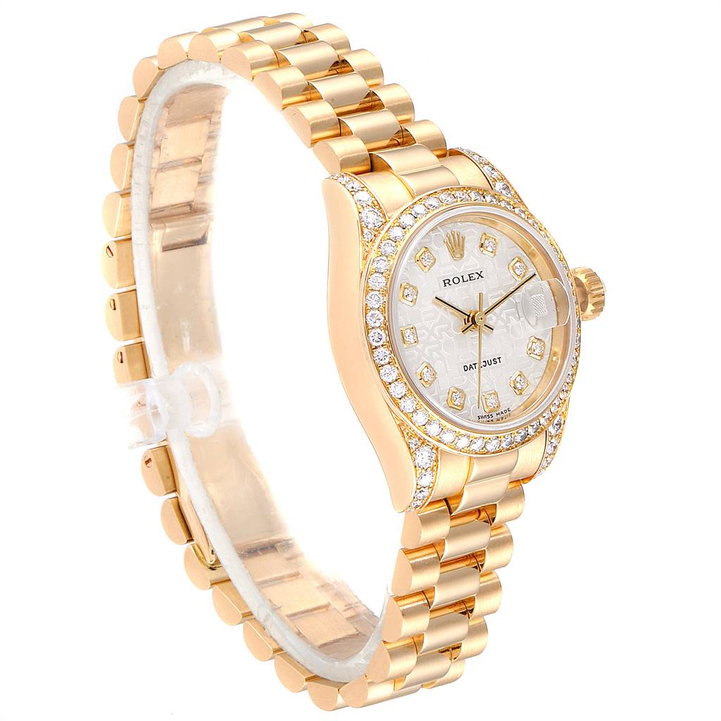 This image shows a side angle view of a Rolex President 179158 Women's Yellow Gold Silver Dial 179158 Women's Yellow Gold Silver Dial model watch, highlighting its gold band, case, and diamond-encrusted bezel.