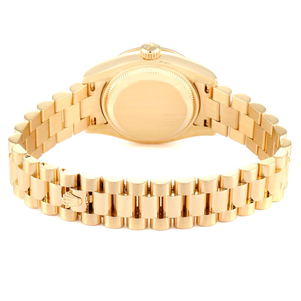 This image shows the back case and bracelet of a Rolex President 179158 Women's Yellow Gold Silver Dial 179158 Women's Yellow Gold Silver Dial model watch from a direct rear angle.