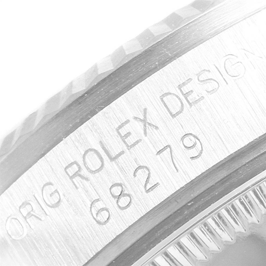 This image shows a close-up of the case side of a Rolex President 68279 Women's White Gold Silver Dial 68279 Women's White Gold Silver Dial watch, highlighting the engraving with the model number.