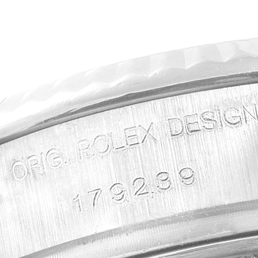 The image shows a close-up of the case serial number and "ORIG. ROLEX DESIGN" engraving on a Rolex President 179239 Women's White Gold Silver Dial 179239 Women's White Gold Silver Dial model watch.