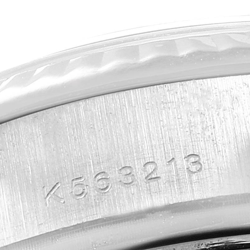 The image shows a close-up of the serial number engraving on the side of the case of a Rolex President 179239 Women's White Gold Silver Dial 179239 Women's White Gold Silver Dial model watch.