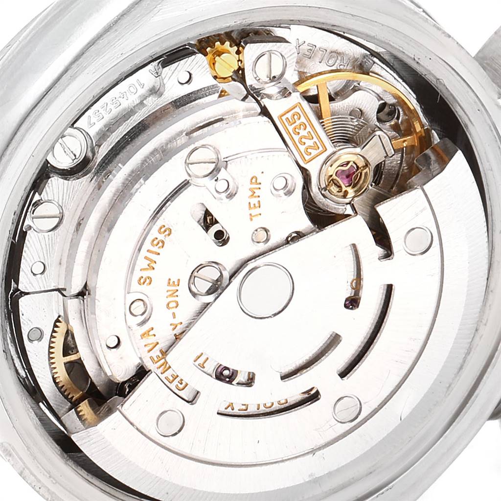 The image shows the inner mechanical movement of a Rolex President 179239 Women's White Gold Silver Dial 179239 Women's White Gold Silver Dial model watch, focused on gears and components.