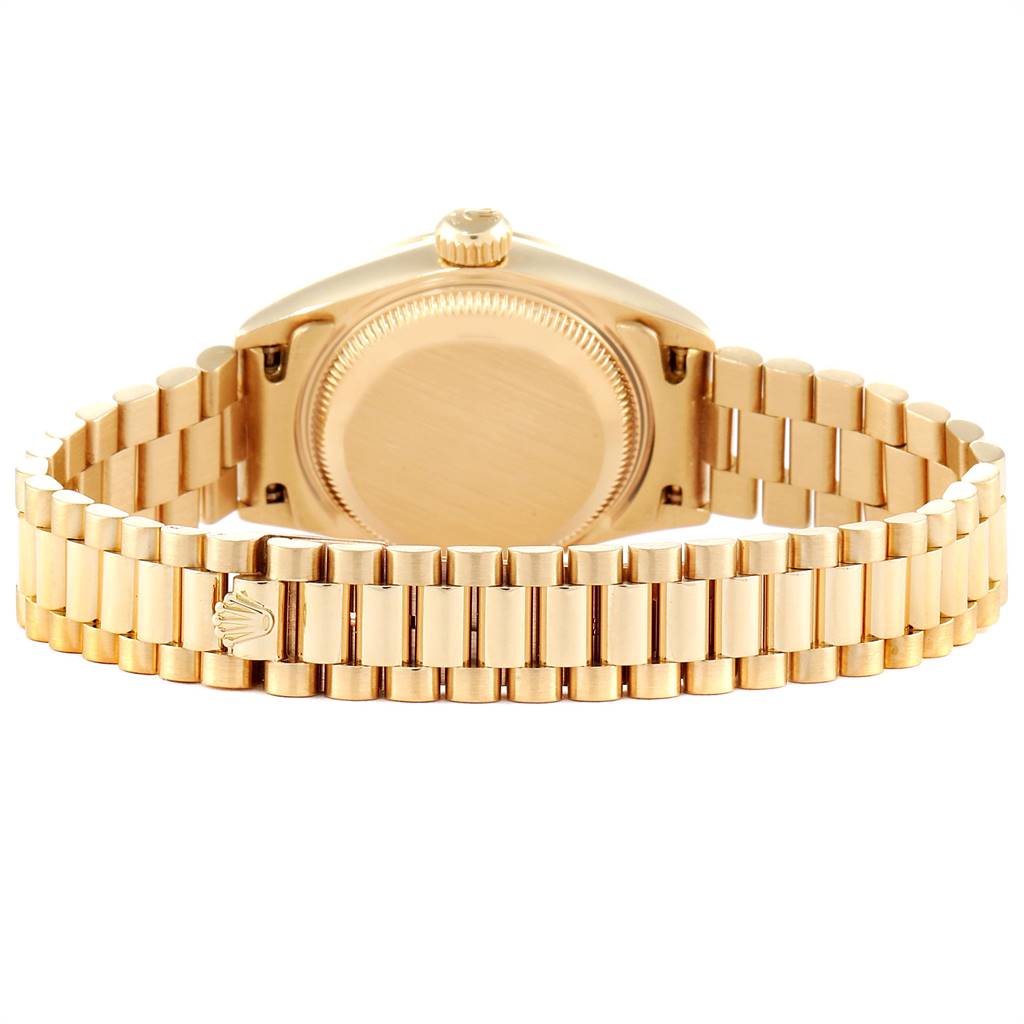 The image shows the back view of a Rolex President 69178 Women's Yellow Gold Silver Dial 69178 Women's Yellow Gold Silver Dial model watch, focusing on its case and bracelet.