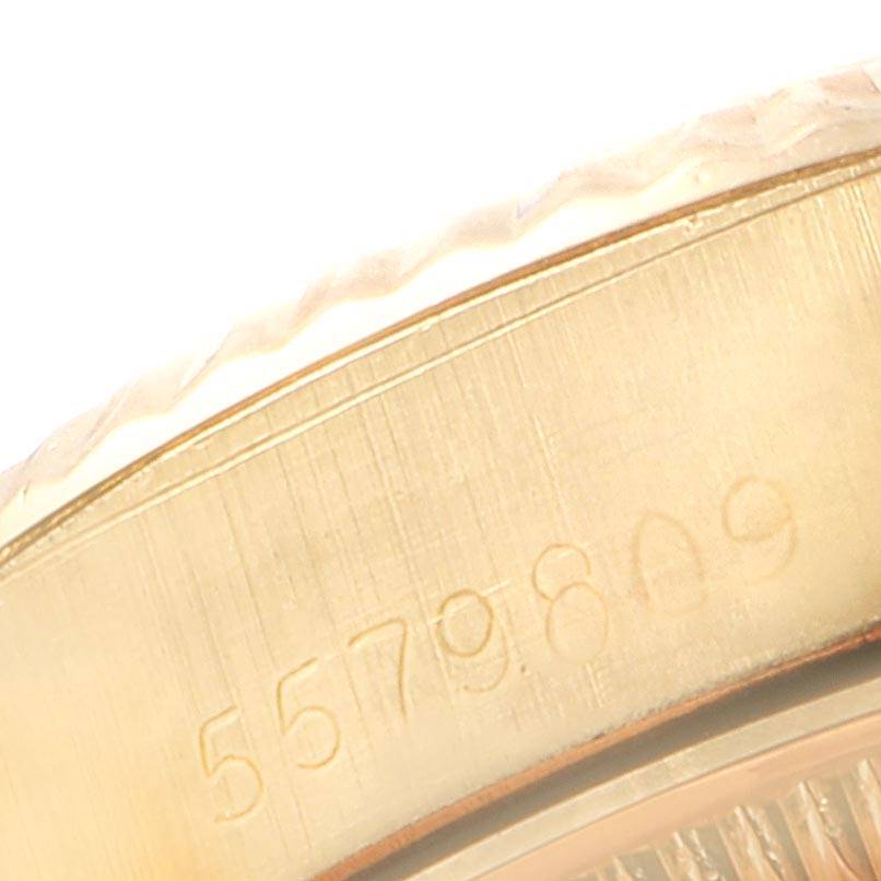 This image shows a close-up view of the serial number engraved on the case side of a Rolex President 6917 Women
s Yellow Gold Champagne Dial 6917 Women
s Yellow Gold Champagne Dial watch.